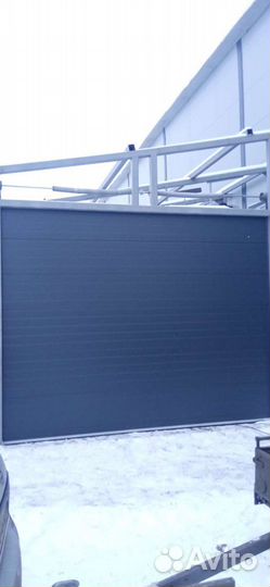 Теплые гаражные секционные ворота подъëмного типа