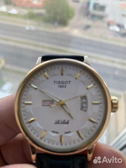 Зодотые часы Tissot