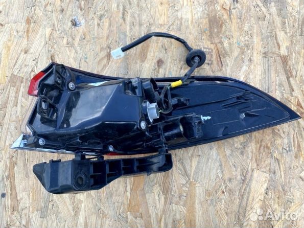 Фонарь левый в крыло Toyota Corolla e210