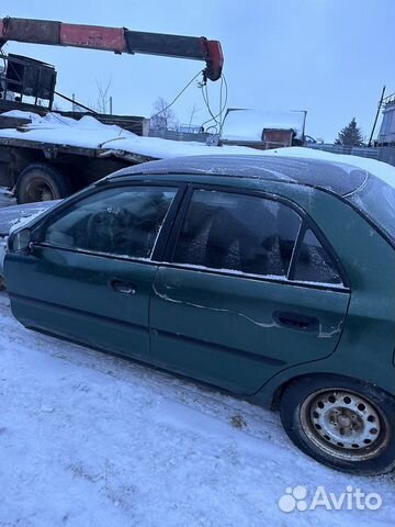 Двери в сборе на Mitsubishi Carisma Перед Зад