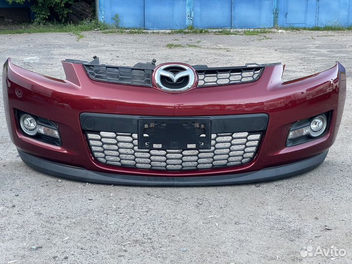 Бампер передний Mazda CX-7 2006-2008 до рест