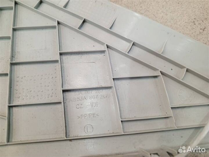 Обшивка стойки задняя левая (внутри) Skoda Rapid