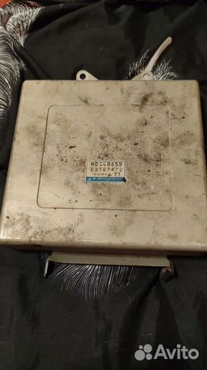 Эбу Mitsubishi Carisma DA2A MD340659