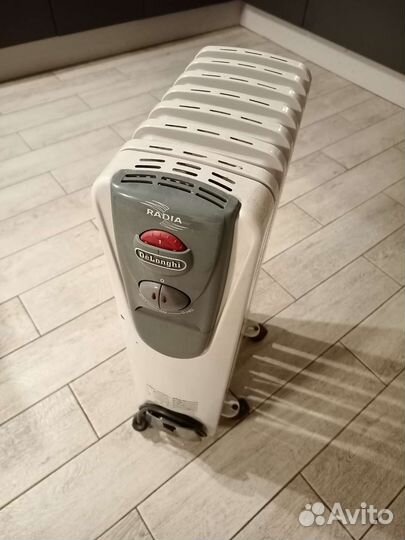 Масляный обогреватель Delonghi