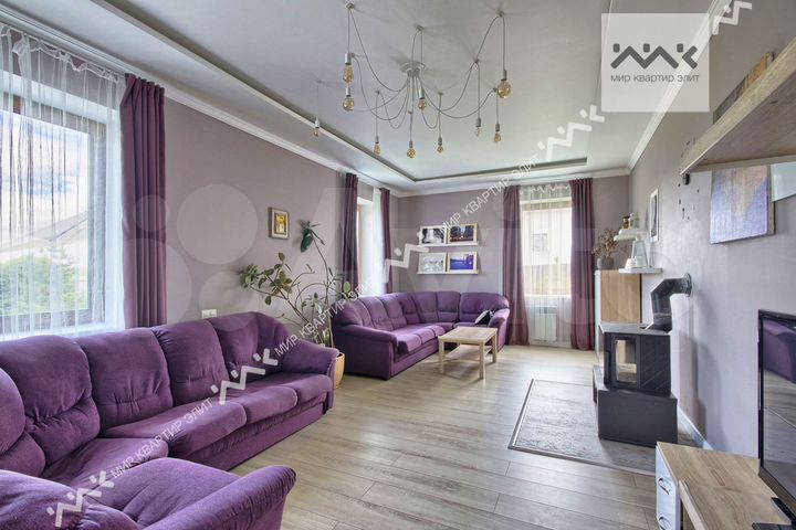 Коттедж 348 м² на участке 18 сот.