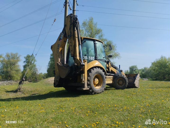Экскаватор-погрузчик CAT 428E, 2011