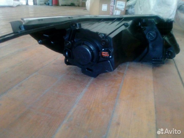 Фара левая Киа Рио 10-14 г. в