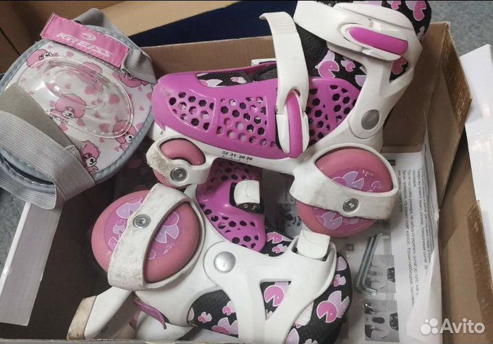 Роликовые коньки раздвижные четырехколесные