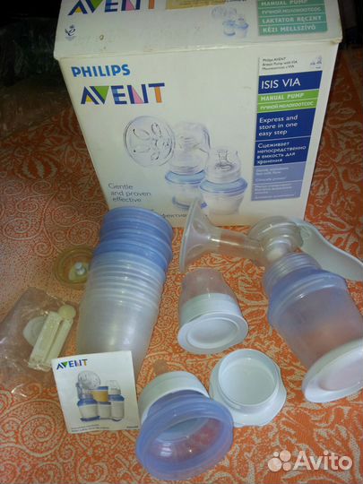 Молокоотсос авент с бутылками,сосками,контейнерами