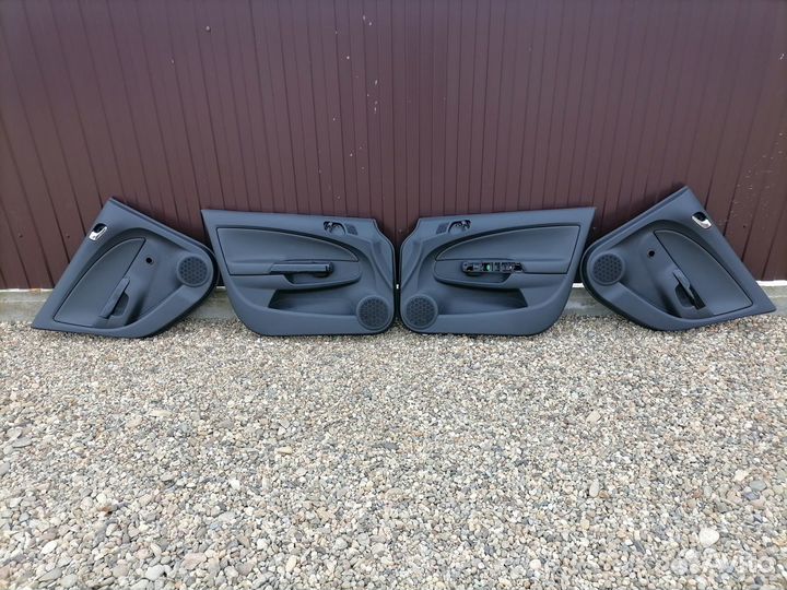 Opel Corsa D обшивки дверей