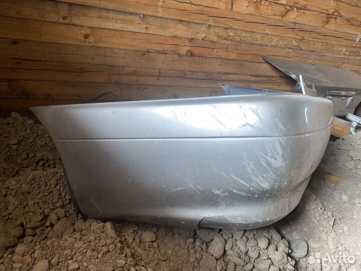 Бампер задний тойота карина