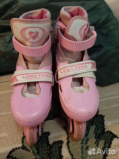 Роликовые коньки