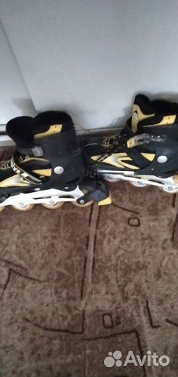 Роликовые коньки