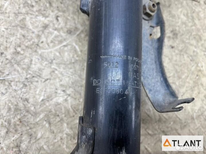 Стойка передняя левая mazda demio