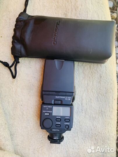 Вспышка камеры Olympus