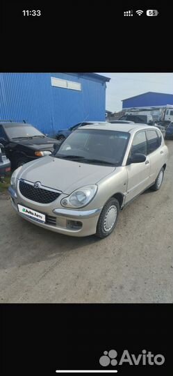 Toyota Duet 1.0 AT, 1998, 100 000 км