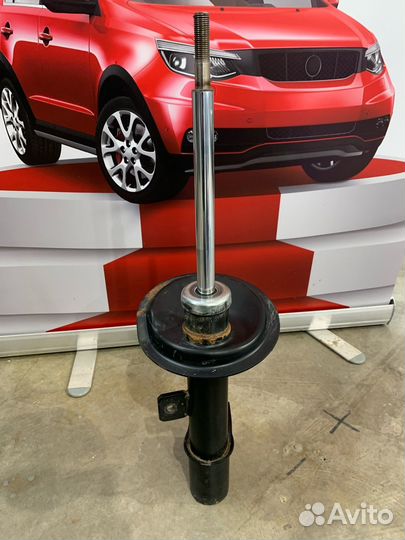 Амортизатор передний левый Пежо 307