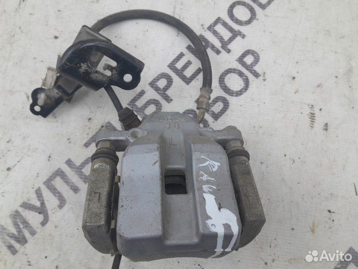 Тормозной суппорт задний левый Toyota Rav4 40