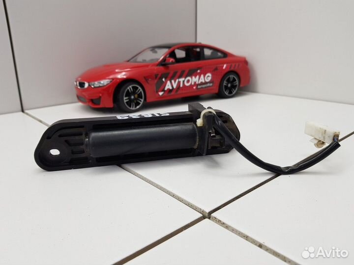 Кнопка открывания крышки багажника