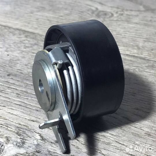 Ролик-натяжитель ремня грм Land Rover Discovery I