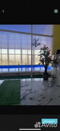 Баня с теплым бассейном и зоной барбекю