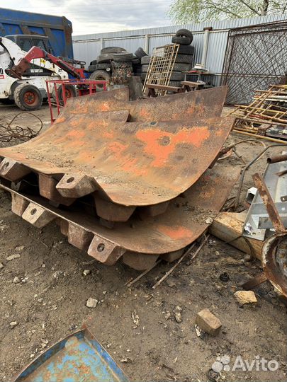 Кулачковый бандаж на грунтовой каток