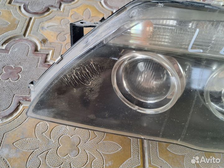Фара левая BMW E65