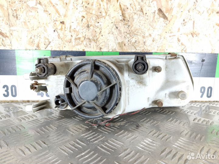 Фара левая Mitsubishi Carisma 2000 2003