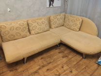 Угловой раскладной диван с креслом и пуфом