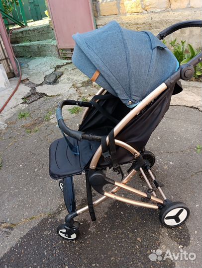 Детская прогулочная коляска