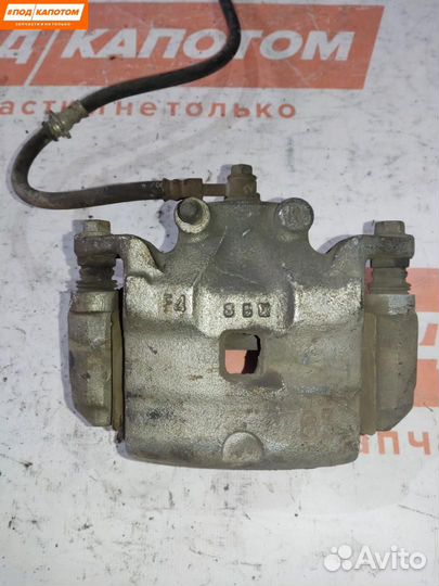 Суппорт тормозной передний правый Nissan Teana J32