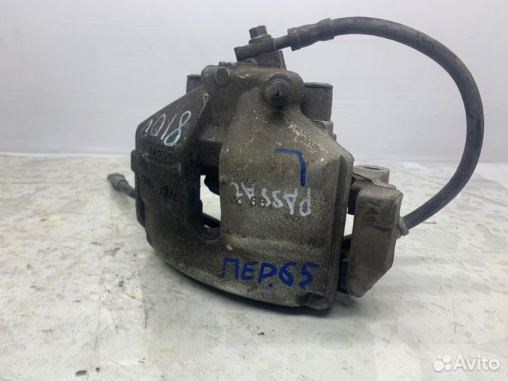 Суппорт передний левый Volkswagen Passat Cc 2.0