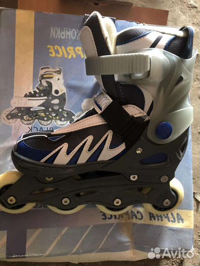 Роликовые коньки