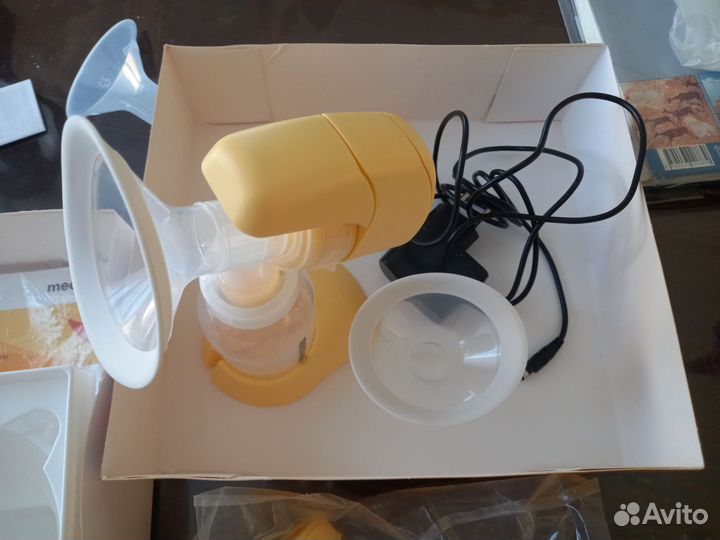 Молокоотсос medela mini electric электрический