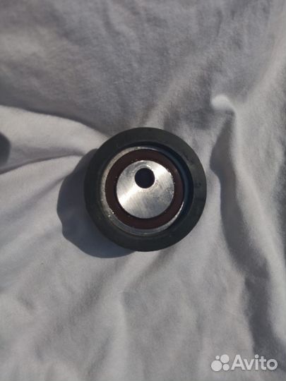 Ролик натяжения ремня грм