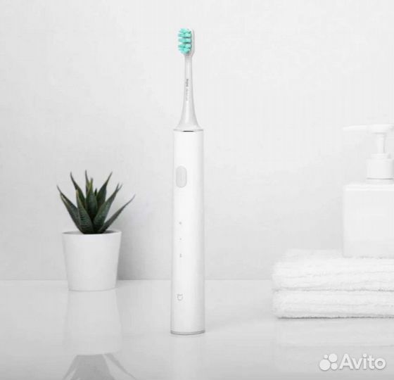 Электронная зубная щетка
