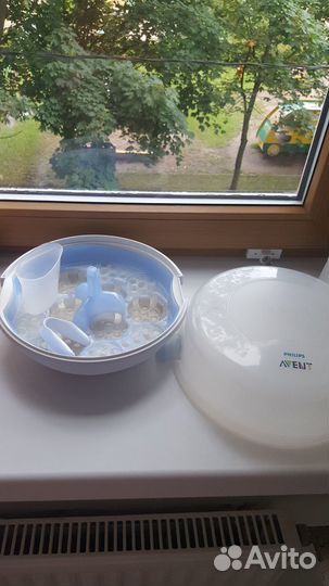 Молокоотсос medela электрический