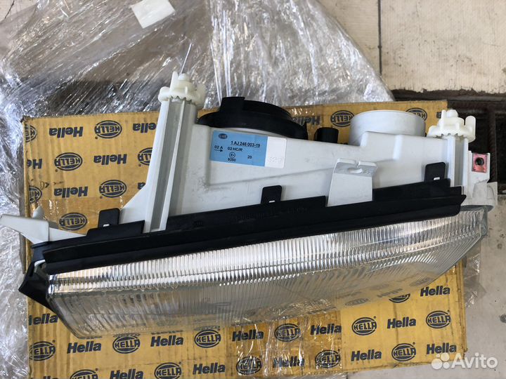 Фара левая hella Skoda Octavia 96-00