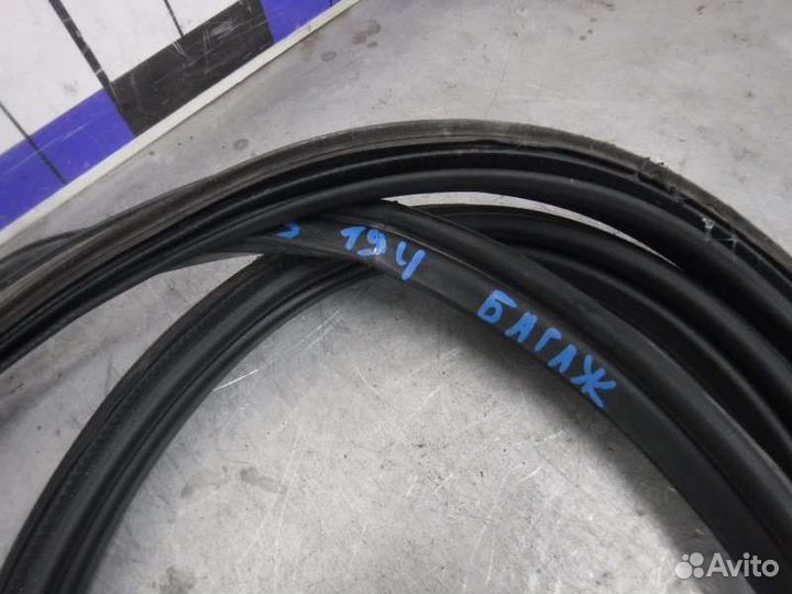 Уплотнитель двери задний Chevrolet Cruze F16D3