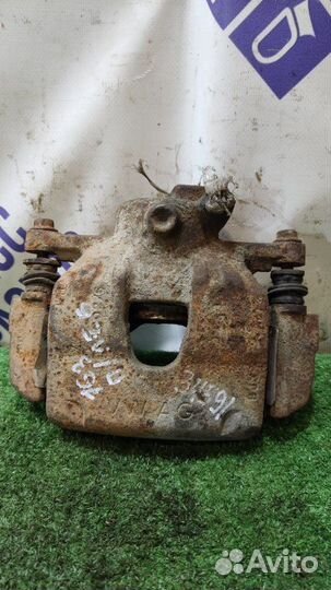 Суппорт передний левый Volkswagen Polo седан 1.6