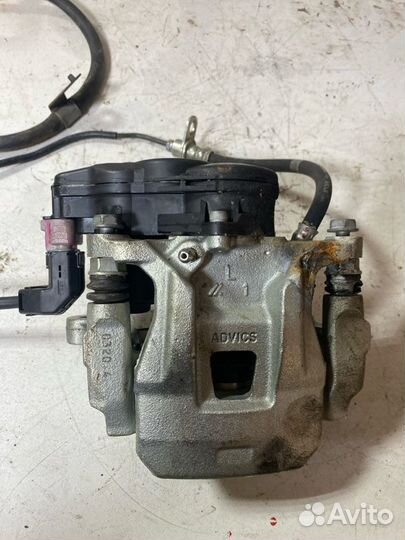 Суппорт тормозной задний левый Mitsubishi