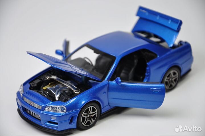 Модель авто Nissan Skyline GT-R R34 1:32 меатлл