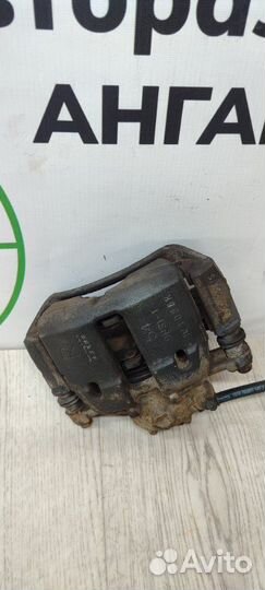 Суппорт тормозной передний правый Mitsubishi Colt