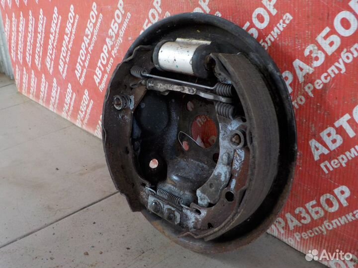 Механизм тормозной задний левый рено сандеро