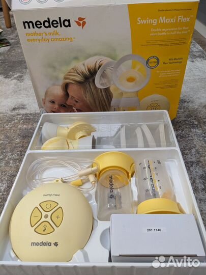 Молокоотсос medela электрический