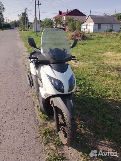 Макси скутер