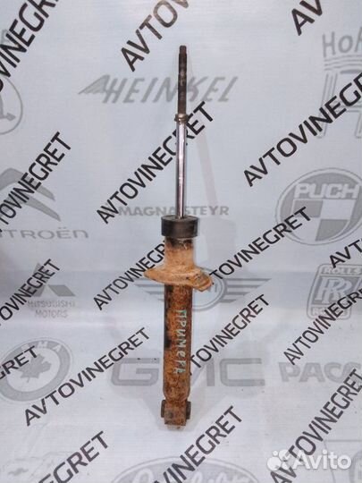 Стойка амортизатор задняя Nissan Primera P12