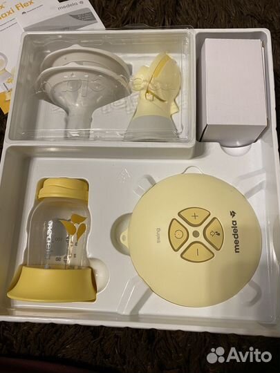 Молокоотсос medela swing flex
