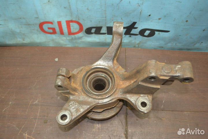 Кулак поворотный левый передний Mazda 323