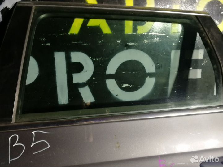 Стекло двери задней левой Volkswagen Passat B5